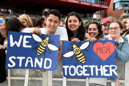 Music stars unite in Manchester as fans face down fears