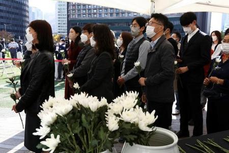 Families seek missing, plan funerals after South Korean Halloween crush