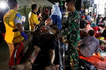 More than 160 dead, hundreds injured after 5.6 earthquake hits Indonesia