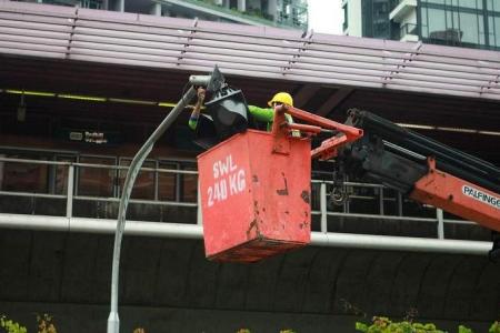 Driver taken to hospital after van crashes into covered walkway at Redhill MRT Station