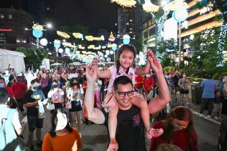 Crowds throng Orchard Road for first ever Christmas Eve street party