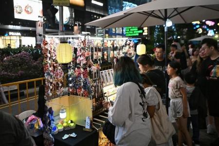 Crowds throng Orchard Road for first ever Christmas Eve street party