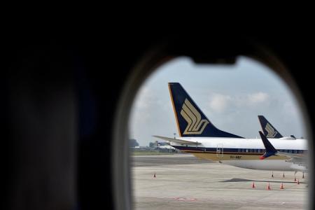 SIA plane rolls backwards at New Delhi airport, stewardess injured