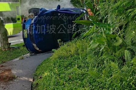 Driver missing after car flips in Yishun accident