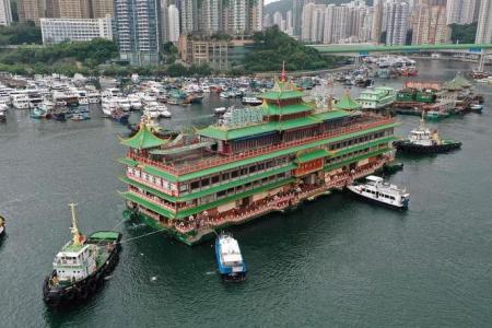 Hong Kong's famed floating restaurant Jumbo towed away after half a century