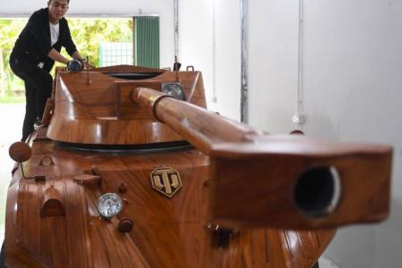 Vietnamese dad converts van into wooden tank for son