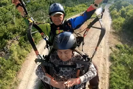 Woman, 87, creates buzz online for paragliding in Sabah 