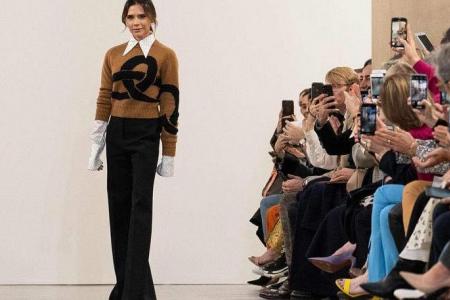 Victoria Beckham makes star-studded debut in Paris