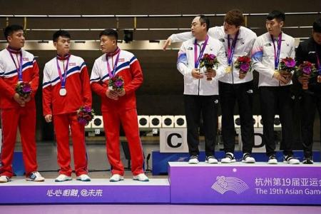 North Korean shooters snub South Koreans on Asian Games podium