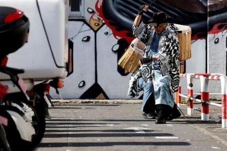 Samurai trash collectors clean Tokyo streets after Halloween revels