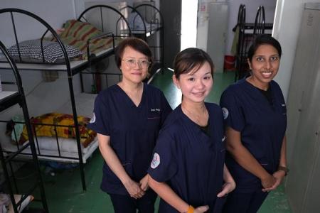 Nurses visit migrant workers’ dorms to care for the sick