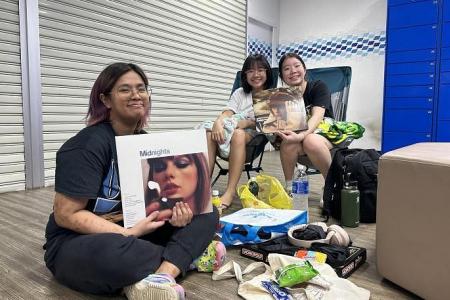 Taylor Swift fans queueing for tickets told to leave SingPost outlets when malls close