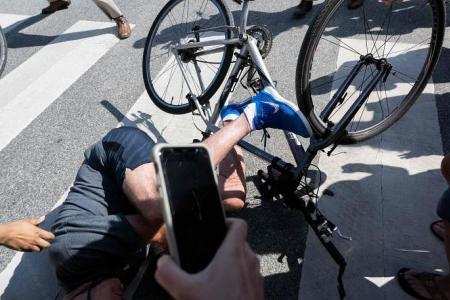 Biden falls off bike while coming to a stop, says he's okay