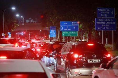 Thousands cross S'pore-Malaysia land borders after reopening