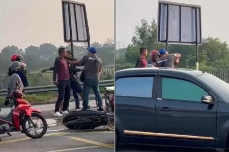 Malaysian police arrest three men in road rage assault case