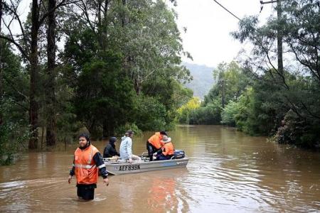 Thousands more evacuate in Sydney even though heavy rains ease