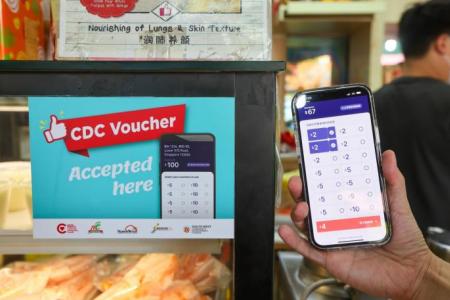 Each S'porean household to get $100 CDC vouchers from today