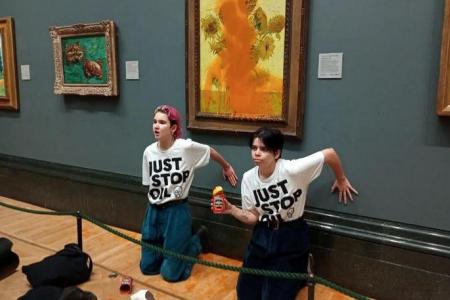 Climate activists throw soup over Van Gogh's 'Sunflowers' in London