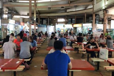 Buzz returns as hawker centres, coffee shops open to groups of 5 from different households