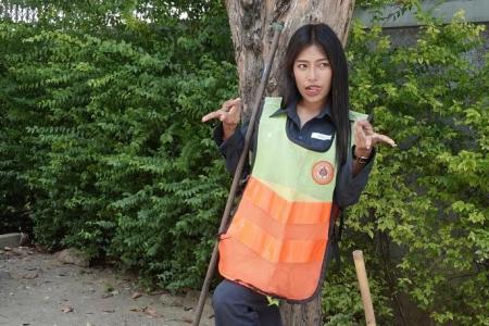 Thailand’s ‘most beautiful’ road sweeper brushes off criticism and defies stereotypes