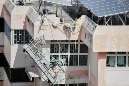 2 workers saved from tipping gondola at Boon Lay HDB block