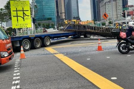 Part of Ophir Road closed after accident involving bus and trailer truck