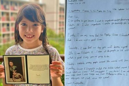 Girl, 8, in S'pore overjoyed after getting signed card from King Charles
