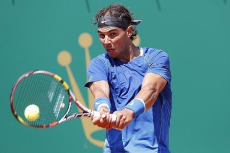 Nadal passes clay landmark