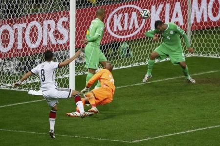Shaky Germany prevail 2-1 after extra time