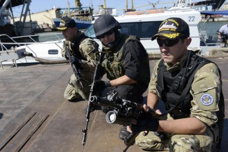 Blasts as experts finally reach MH17 crash site in Ukraine