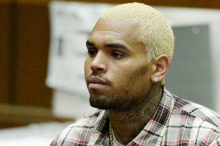 Chris Brown gives advice to NFL player who punched his wife: 'I've been down that road.'