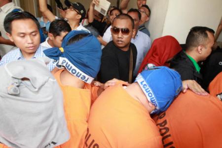 Want to hide your face in M'sian court? Wear a T-shirt, not undies