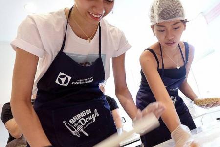 New Face finalists get busy in charity bake-a-thon