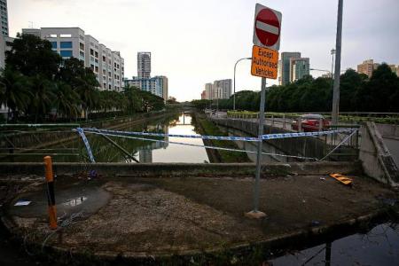 Cabby rescued after taxi plunges into canal at Whampoa
