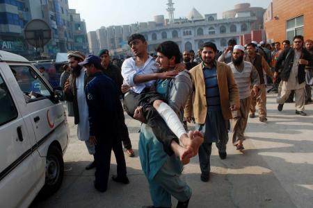 Taleban attack on Pakistan school leaves more than 130 people dead