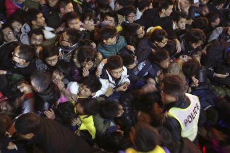 New Year tragedy: Stampede in Shanghai after fake money thrown to crowd