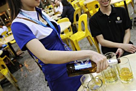 Shorter skirts, more business for a beer promoter