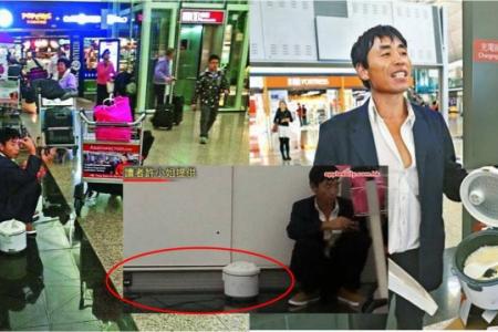 Ex-construction worker in S'pore spotted cooking rice in Hong Kong airport