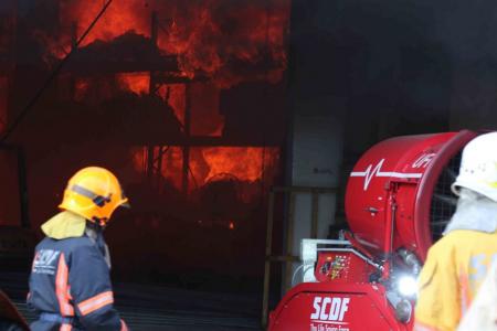 Watch: Firefighters battle early morning blaze in Joo Koon