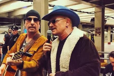 U2 turn buskers on New York subway