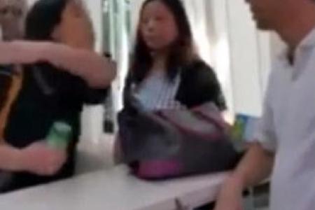 Second woman in Simei condo row charged