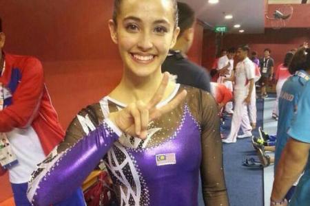 Thousands back M'sian gymnast over outfit row