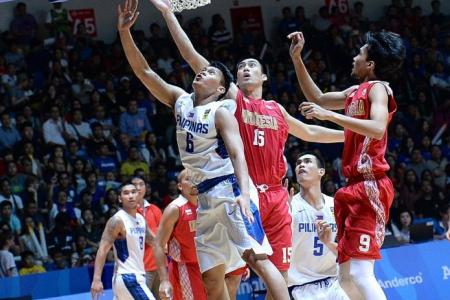  Philippines survive stern test to earn basketball gold