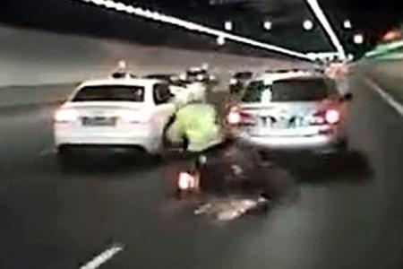 Couple hurt after bike hits braking car