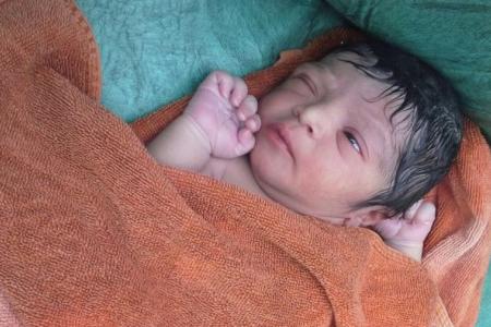 Newborn baby abandoned in plastic bag