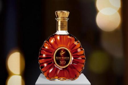 Why did woman down $280 cognac just before flying?