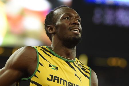 WIN a top signed by Usain Bolt