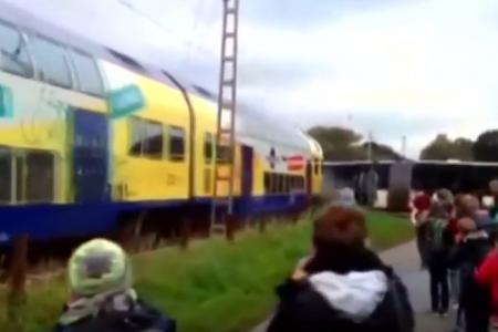 Train crashes into evacuated school bus in Germany