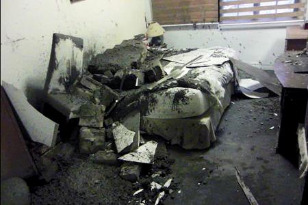 Close shave for man as concrete slab crashes on bed