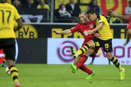 New coach Tuchel inspires Borussia Dortmund to 11th straight win